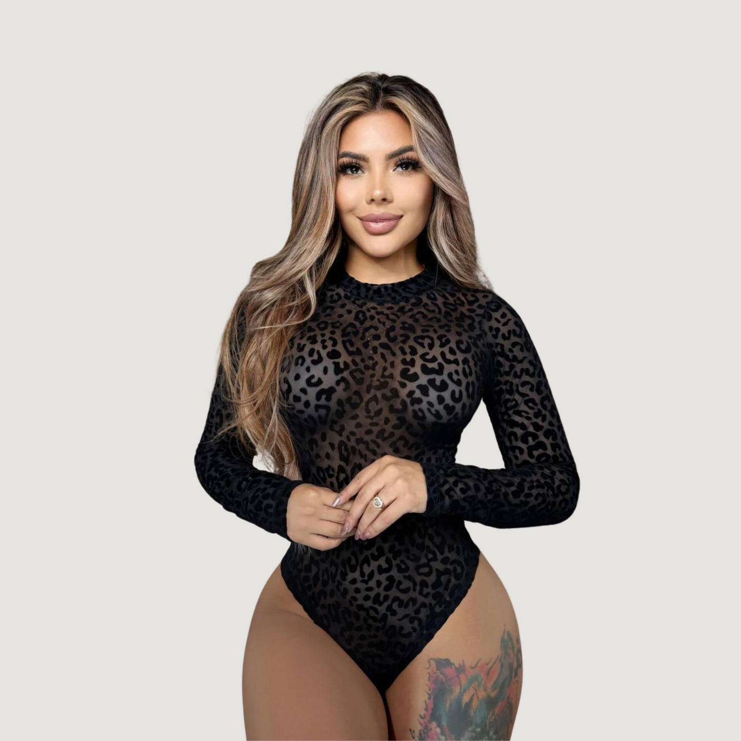 Leopard Mesh Bodysuit with Velvet Texture..